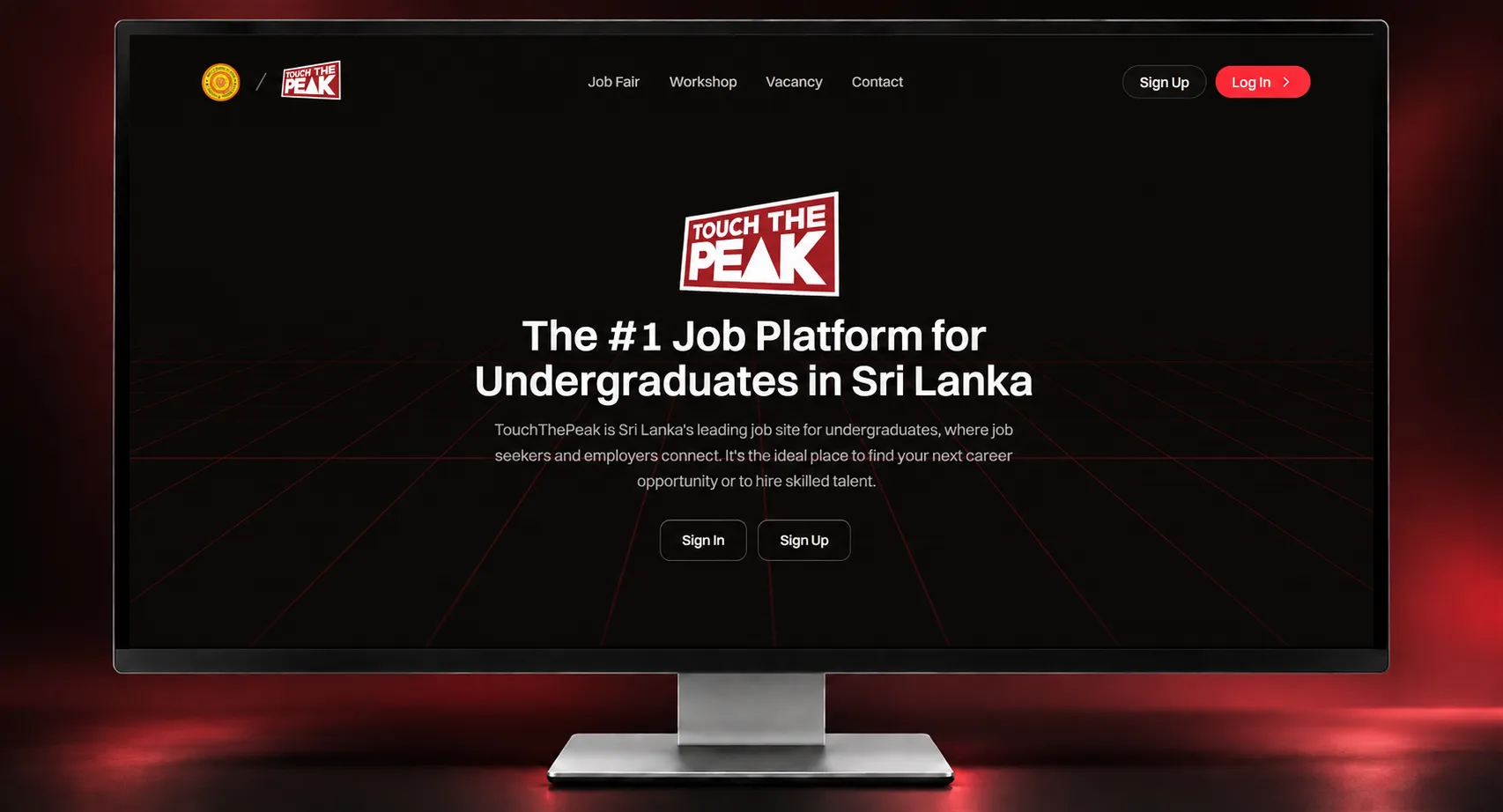 Touch The Peak university job platform landing page displayed on a desktop monitor